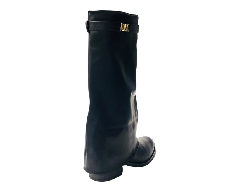 Knee-high faux leather boots with a fold-over design and flat sole